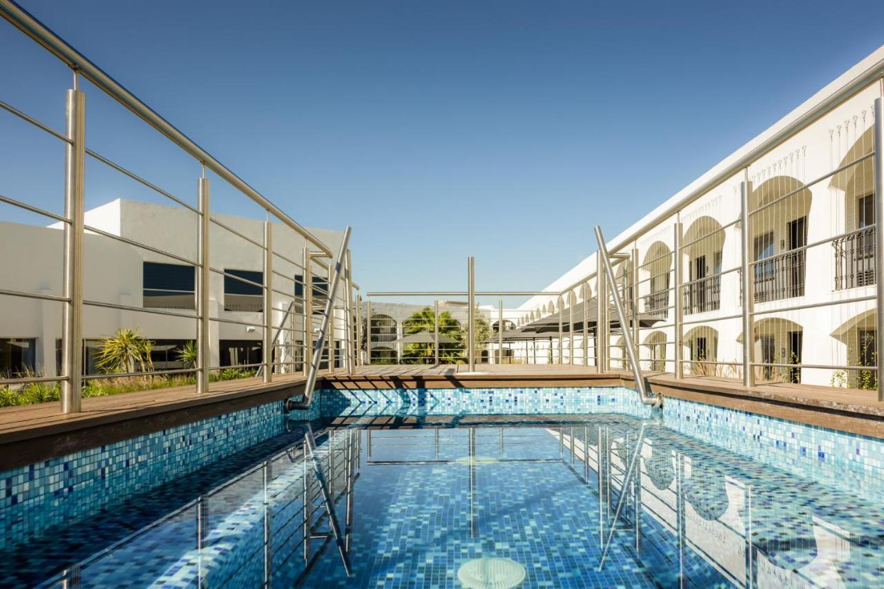Gamma Ciudad Juarez Hotel Buitenkant foto The swimming pool at the school